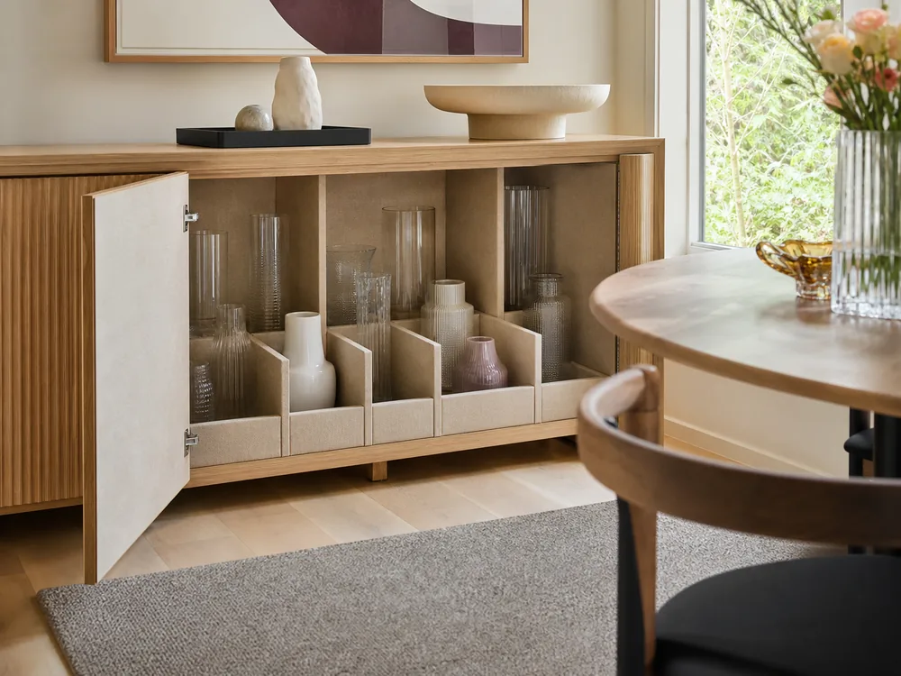 small apartment flower vase storage ideas showing divided vase cabinet